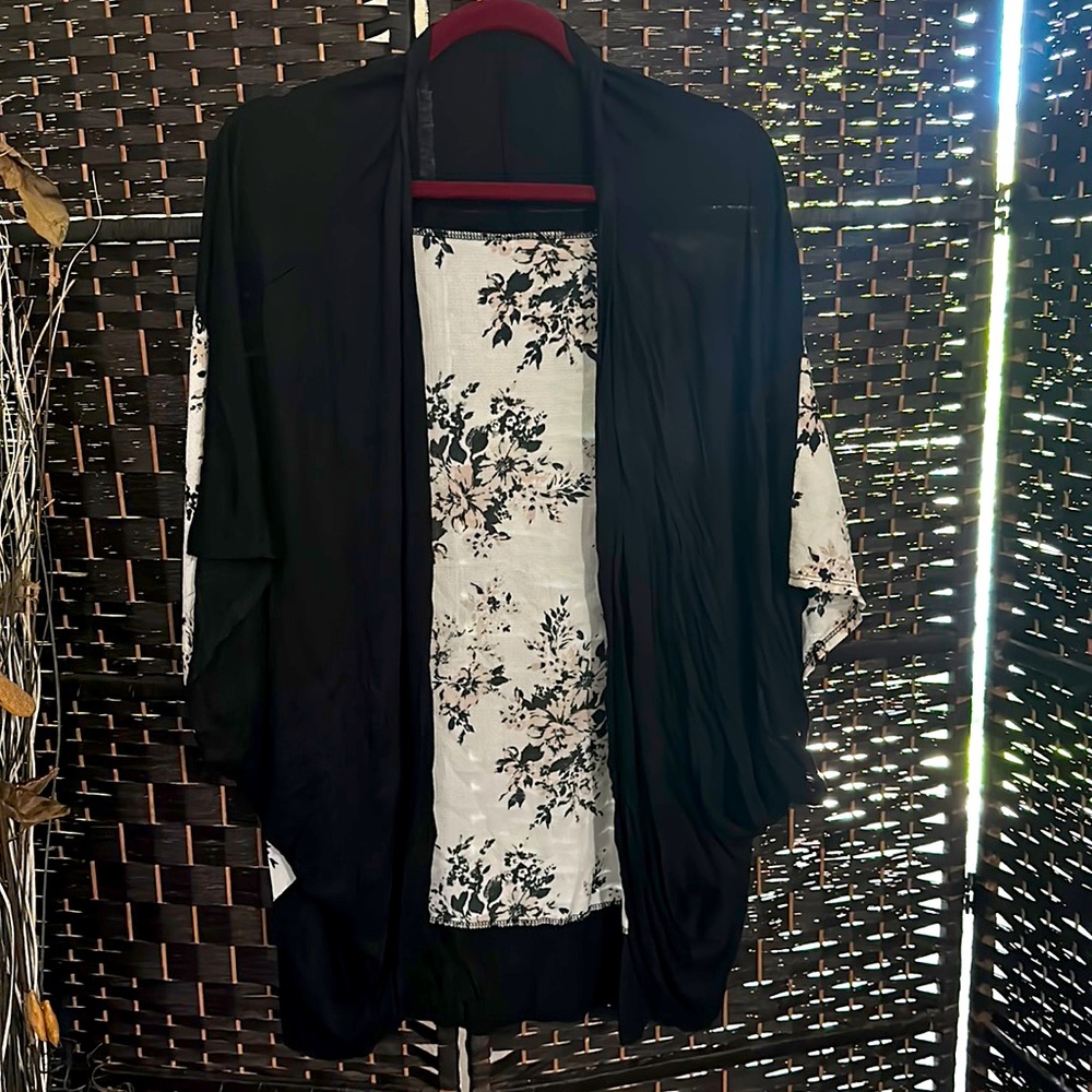 Black and floral cardigan. One size, great condition no stains rips or tears.